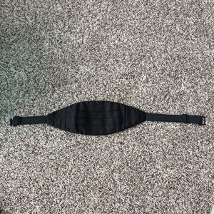 black adjustable waist cummerbund for suits, tuxedos, and uniforms